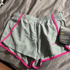 Running shorts. New with tags. Smoke free home.